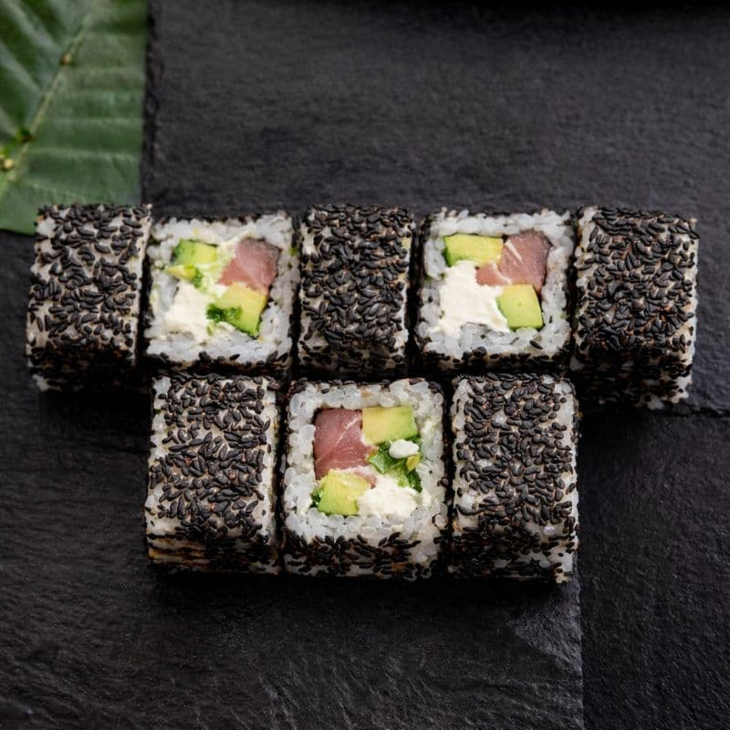 Ebi Black Uramaki — A roll with tuna and black sesame for a contrast of flavors 