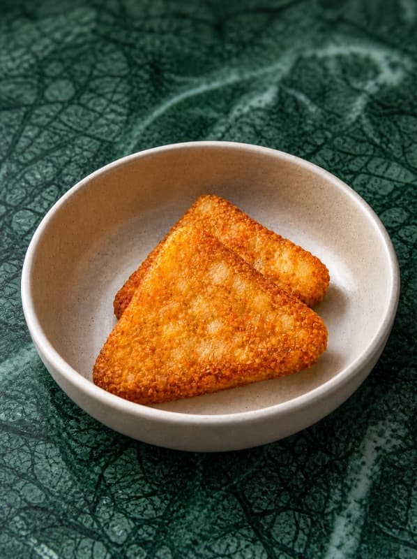 Hashbrown  — Golden crispy hashbrowns with a soft potato center. Perfectly crunchy and satisfying.