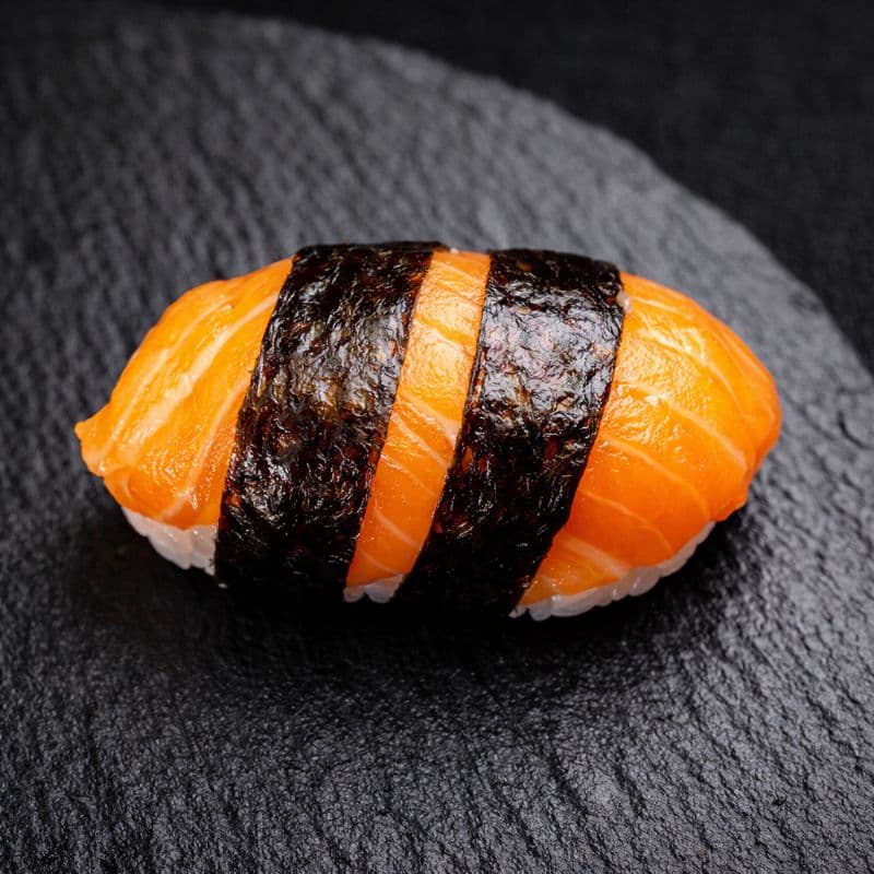 Nigiri Sake — A delicate slice of salmon on a bed of rice