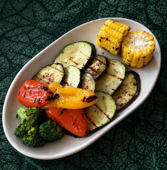 Grilled veggies — Fresh grilled vegetables including zucchini, eggplant, broccoli, and bok choy. Light, healthy, and f