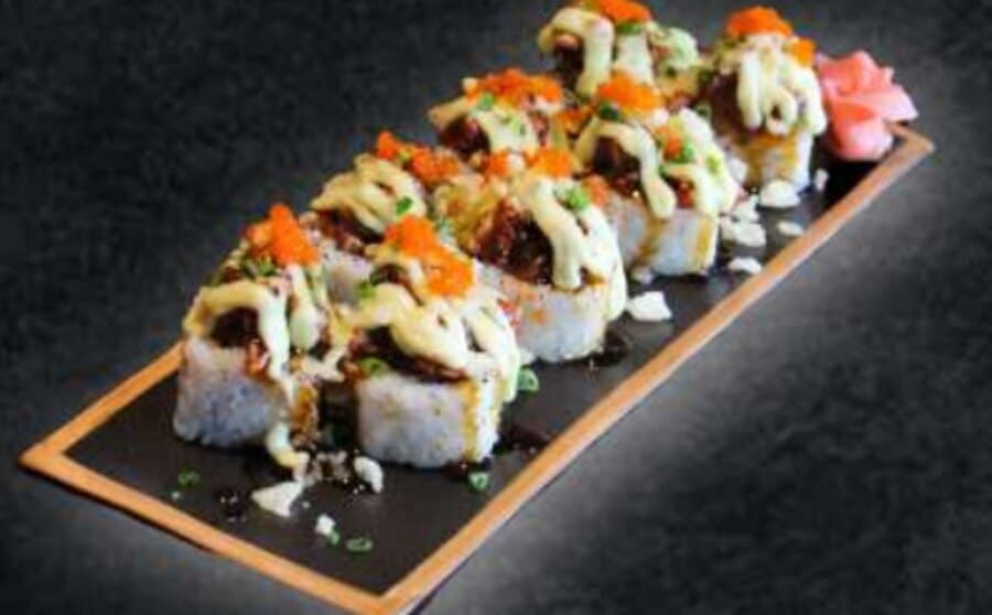 Fuji Roll — Rice, nori, prawn tempura, avocado, cucumber, spicy tuna, teriyaki sauce, wasabi mayo, spring onion,