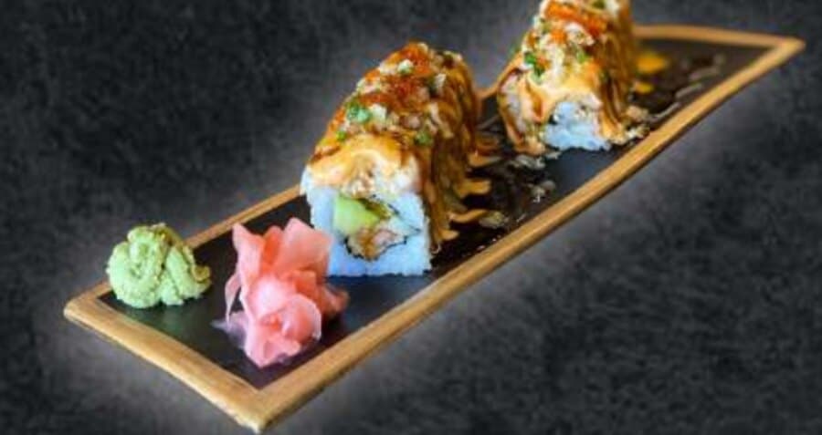 King of Ninja Roll — Rice, nori, prawn tempura, avocado, cucumber, mix fish, teriyaki sauce, spicy mayo, crunchy, spring