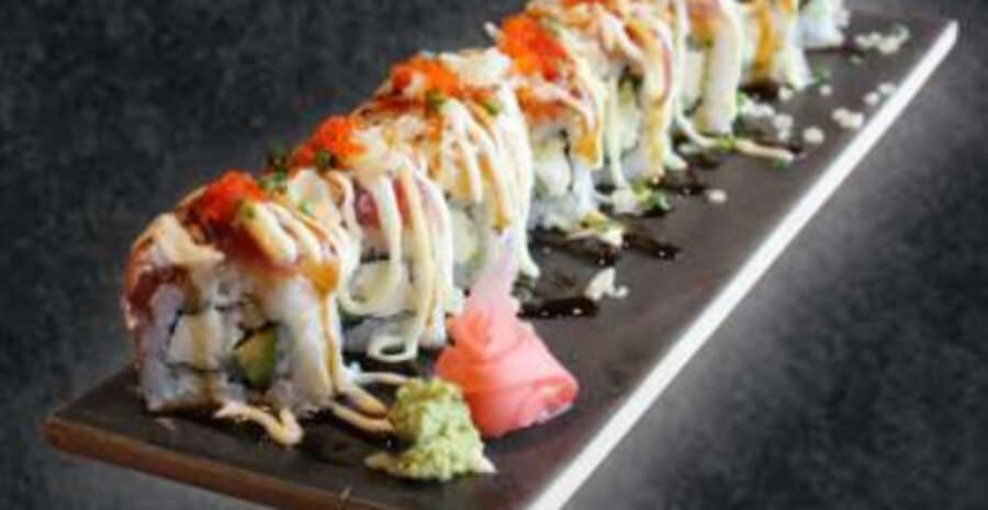 Queen of Ninja — Rice, nori, avocado, cucumber, cheese, mix fish, teriyaki sauce, mayonnaise, crunchy, spring onion,