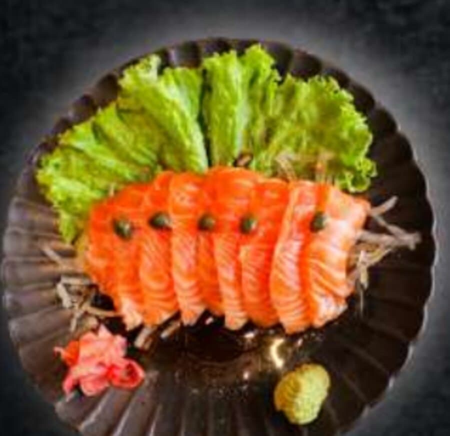 Salmon Carpaccio — 9 slices salmon, capers, onion slices, ponzu sauce with olive oil