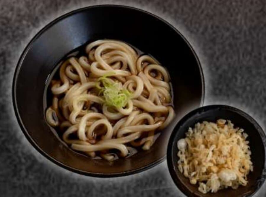 Udon — Thick wheat noodles, dashi broth, leek, crunchy